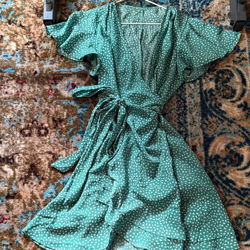 Teal green wrap dress with white polka dots